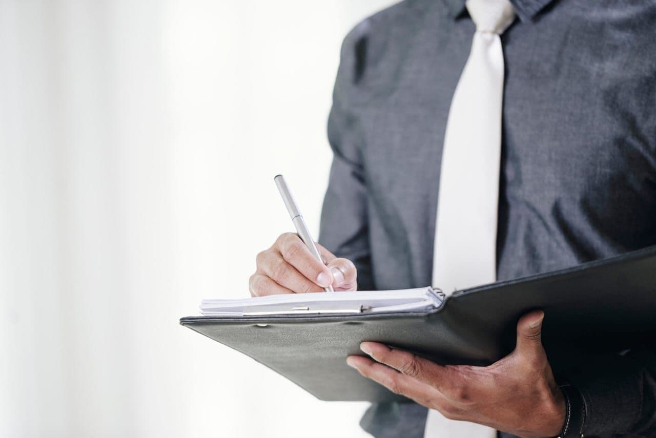Business professionals signing partnership contracts and agreements